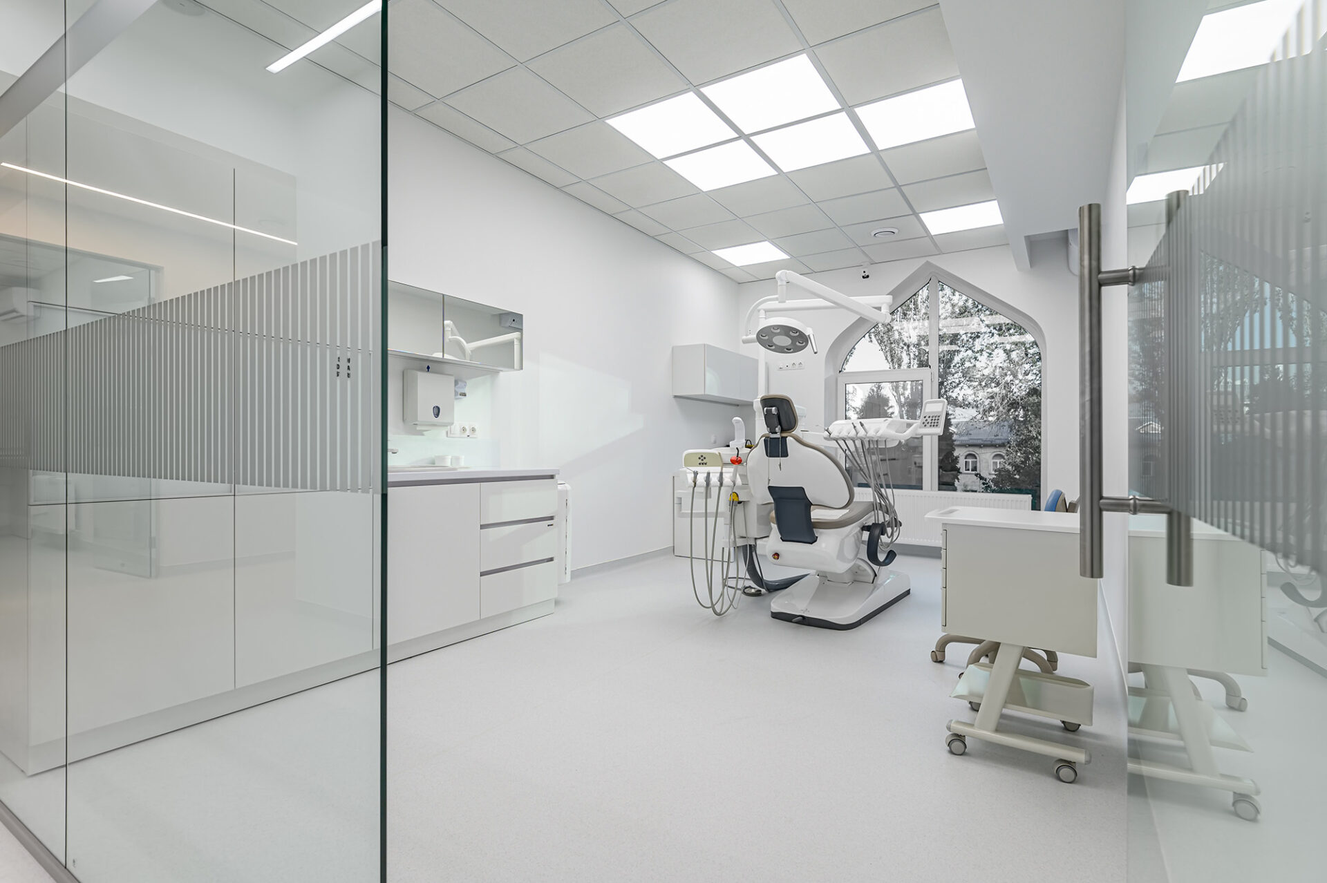 Interior of white modern dentistry medical room with special equipment