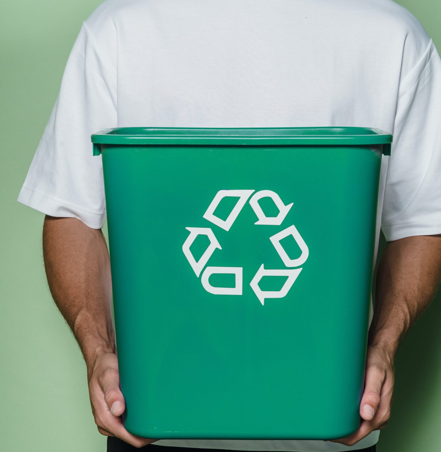 Man holding recycling bin